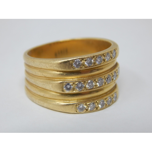 200 - 18ct Gold Ring Set with three rows of round brilliant cut diamonds (17 total) Size P: Weight 11.01g