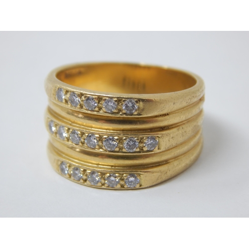 200 - 18ct Gold Ring Set with three rows of round brilliant cut diamonds (17 total) Size P: Weight 11.01g