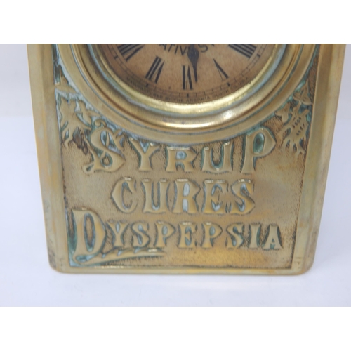 301 - MOTHER SEIGELS CURATIVE ADVERTISING CLOCK. 7.8ins tall, heavily embossed brass body in the shape of ... 