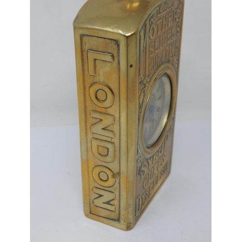 301 - MOTHER SEIGELS CURATIVE ADVERTISING CLOCK. 7.8ins tall, heavily embossed brass body in the shape of ... 