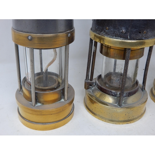 309 - A Group of Unmarked Miners Lamps: Tallest 27cm