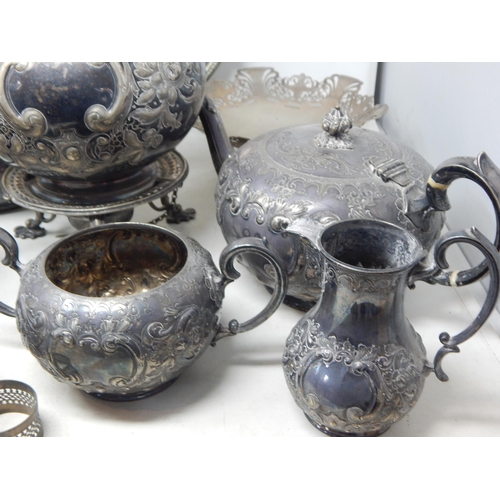 102 - A Large Quantity of Silver Plated Wares Including Tea Sets, Tea Kettles etc (lot)