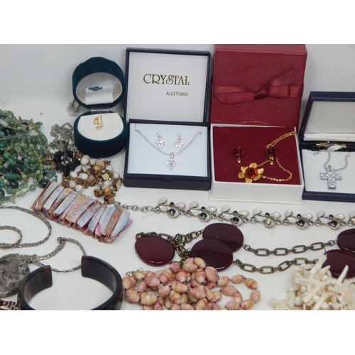 229 - A Huge Quantity of Vintage Costume Jewellery Including Brooches, Beaded Necklaces, Bangles etc (lot)