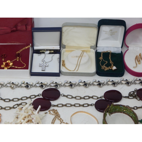 229 - A Huge Quantity of Vintage Costume Jewellery Including Brooches, Beaded Necklaces, Bangles etc (lot)