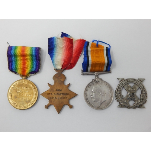 1 - WWI Trio of Medals Awarded & Named to: S-7534 PTE R. FLETCHER: GORDON HIGHLANDERS. Together with cap... 