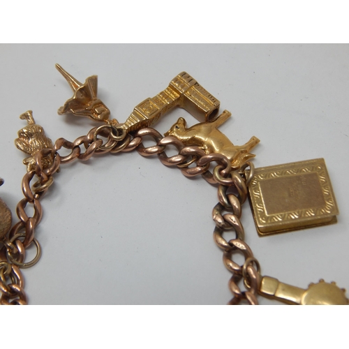 237 - 9ct Gold Charm Bracelet with Numerous Charms: Gross weight 27.49g