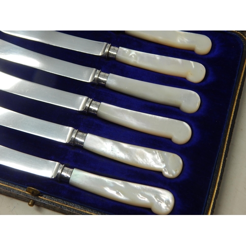 141 - A Set of Silver Bladed Knives with Mother of Pearl Handles in Fitted Case: Hallmarked Sheffield 1912... 