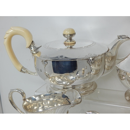 147 - A Four Piece Silver Tea Service, Comprising Teapot, Hot Water Jug, Lidded Sugar Bowl & Milk Jug: Hal... 