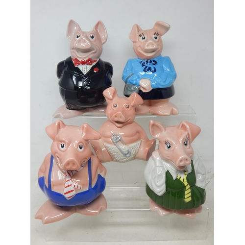 A Set of 5 Nat West Piggy Banks by Wade with stoppers.