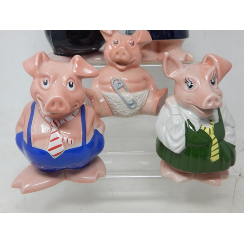 332 - A Set of 5 Nat West Piggy Banks by Wade with stoppers.