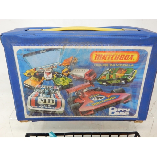 335 - A Matchbox Carry Case containing two trays of model vehicles (24)