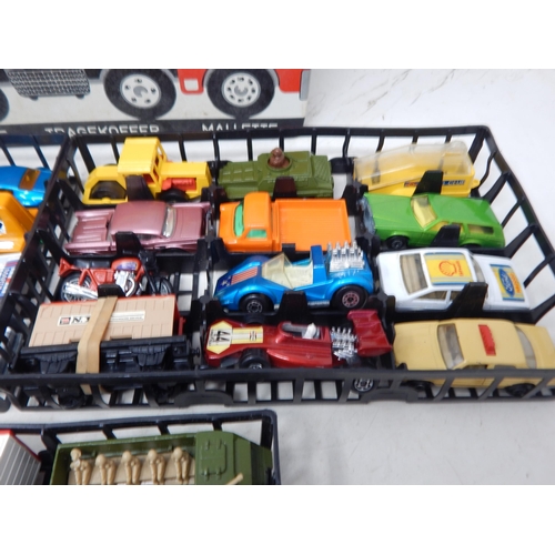 338 - A Matchbox Carry Case containing three trays of model vehicles (36)