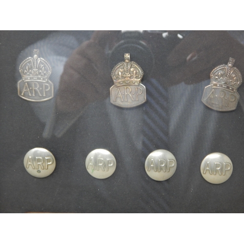 381 - WWII Framed Collection relating to Air Raid Warden Including 3 x Silver ARP Badges, Buttons & Door P... 