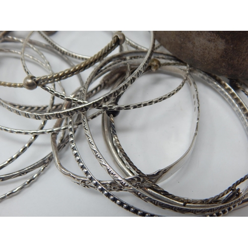 248 - A Quantity of Silver Bangles 160g together with white metal examples