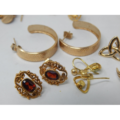 257 - A Quantity of 9ct Gold Earrings 4.8g together with a small quantity of yellow metal items 5.8g