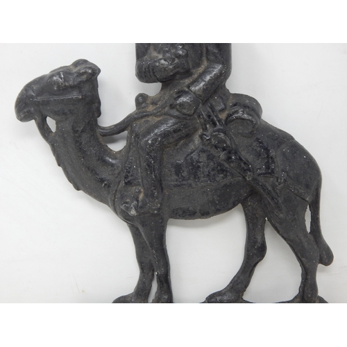 412 - 19th Century Cast Iron Door Stop Depicting a Soldier on a Camel