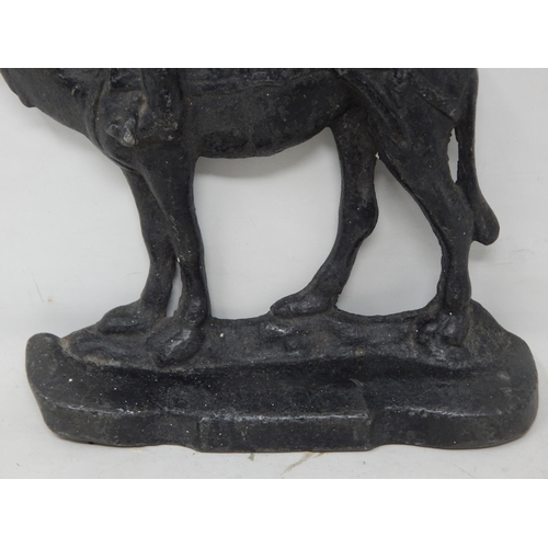 412 - 19th Century Cast Iron Door Stop Depicting a Soldier on a Camel