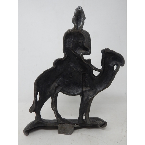 412 - 19th Century Cast Iron Door Stop Depicting a Soldier on a Camel