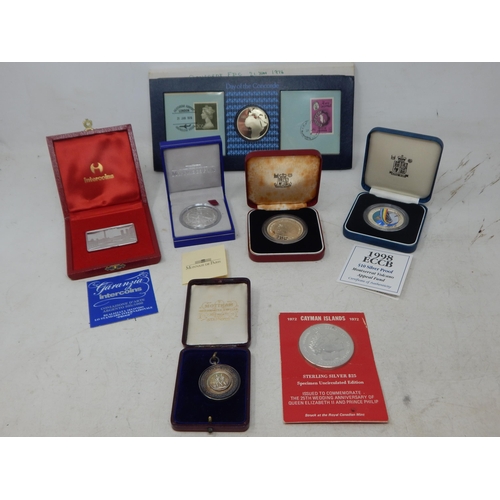 73 - Silver Commemorative Coins Including: Royal Mint 1998 ECCB, 1972 Cayman Islands QEII 25th Wedding An... 