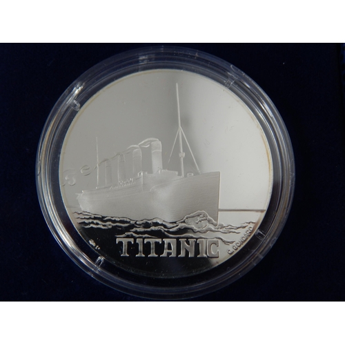 77 - R.M.S Titanic: 5 x Silver Commemorative Medals together with a Royal Mint Centenary £5 Coin in Pack ... 