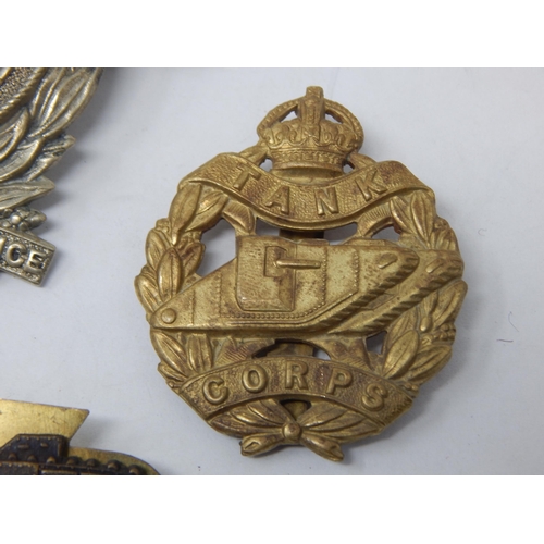 86 - A WWI Mine Clearance Service Badge, WWI British Tank Corps Officers Cap Badge & two Further Tank Bad... 