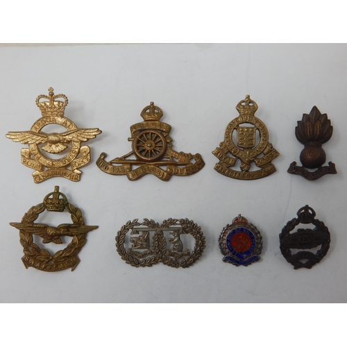 100 - A Collection of Military Badges to Include: WWI Tank Badge, Royal Artillery (2), Royal Canadian Ordn... 