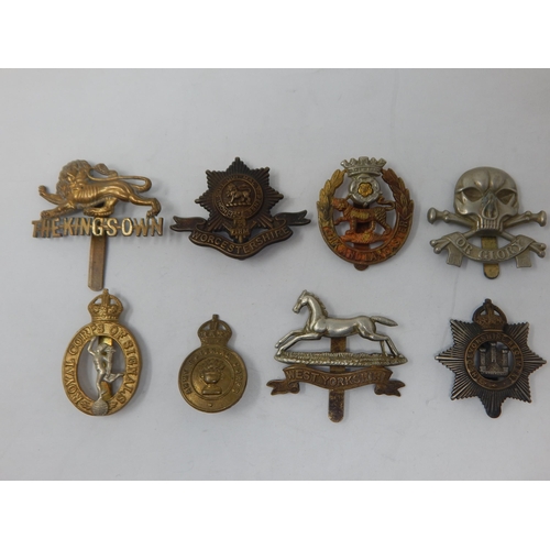 94 - A Collection of Military Badges to Include: The Kings Own, Worcestershire Regiment, Royal Corps of S... 