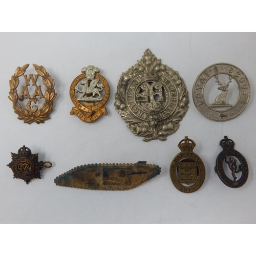 96 - A Collection of Military Badges to Include: WWI Tank Badge, Queens, Royal Corps of Signals, Women's ... 