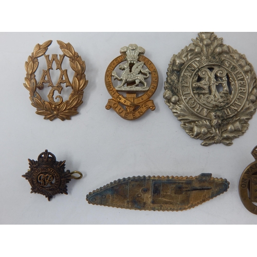 96 - A Collection of Military Badges to Include: WWI Tank Badge, Queens, Royal Corps of Signals, Women's ... 