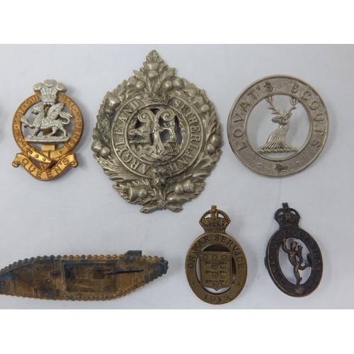 96 - A Collection of Military Badges to Include: WWI Tank Badge, Queens, Royal Corps of Signals, Women's ... 