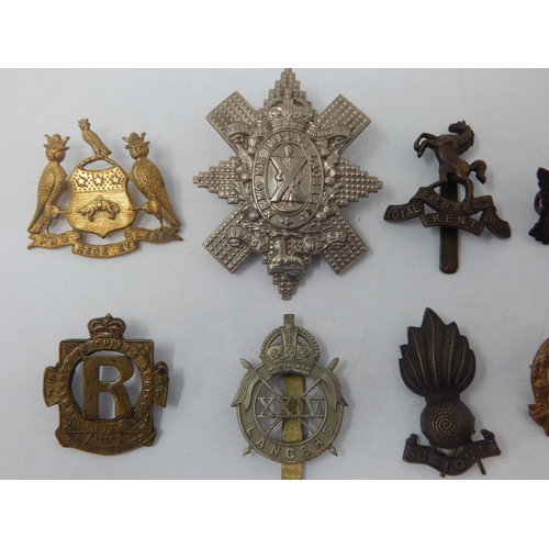 99 - A Collection of Military Badges to Include: The Royal Highlanders Black Watch, Royal Artillery, 24th... 