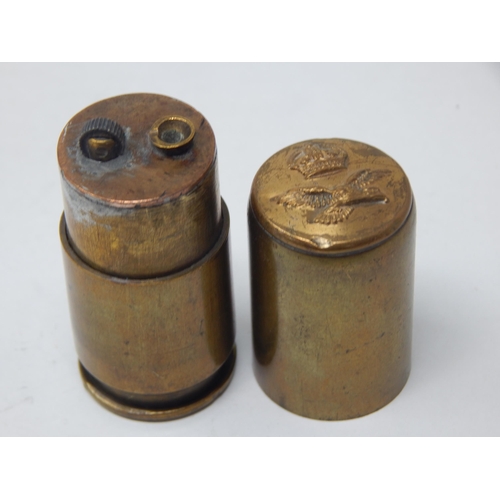 102 - WWII Royal Air Force Insignia Trench Art Lighter formed from a 20mm bullet dated 1941