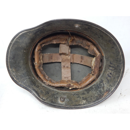 206 - A WWI German M17 Helmet with orginal paint. Please Note: Customers must satisfy themselves prior to ... 