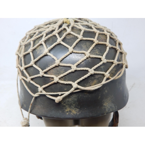 208 - A WWII German Paratroopers Helmet with eagle & swastika decal to one side. Please Note: Customers mu... 