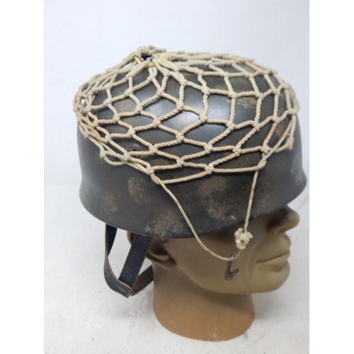 208 - A WWII German Paratroopers Helmet with eagle & swastika decal to one side. Please Note: Customers mu... 