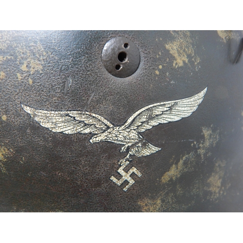 208 - A WWII German Paratroopers Helmet with eagle & swastika decal to one side. Please Note: Customers mu... 