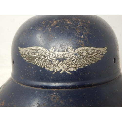 209 - A WWII German Luftchutz M35 Helmet marked RL239/10. Please Note: Customers must satisfy themselves p... 