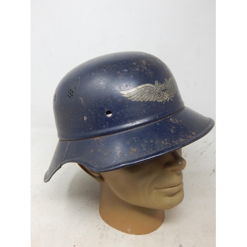 209 - A WWII German Luftchutz M35 Helmet marked RL239/10. Please Note: Customers must satisfy themselves p... 