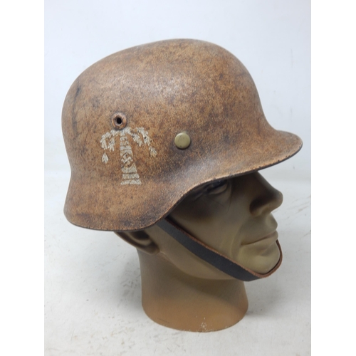 210 - WWII German M42 Helmet with Africa Corps Insignia. Please Note: Customers must satisfy themselves pr... 