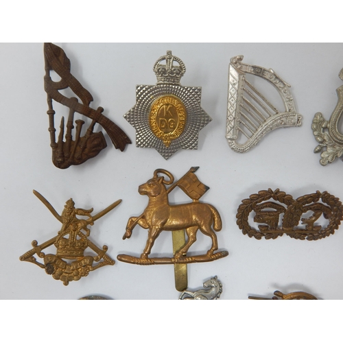 129 - Military Cap Badges Including Queen Regiment, Royal Artillery, Argyle & Sutherland etc