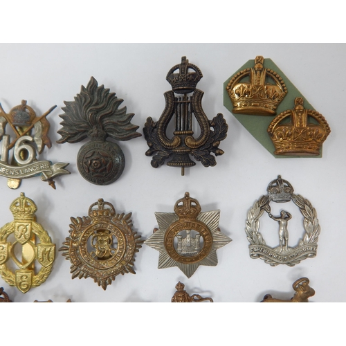 138 - Group of KGVI Military Cap Badges etc