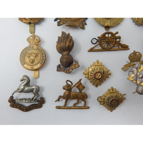 139 - Quantity of Military Cap Badges etc