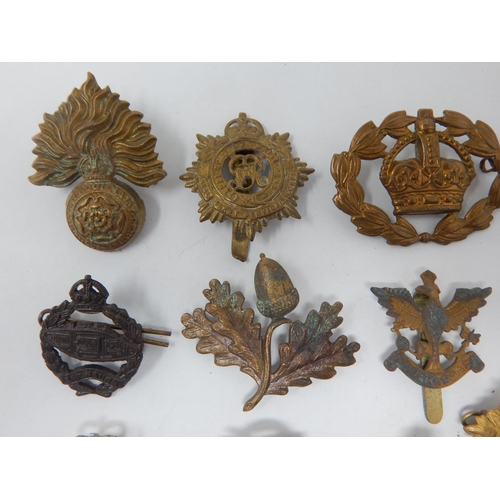 142 - Quantity of Military Cap Badges Including Hussars, Royal Navy Army Service Corps