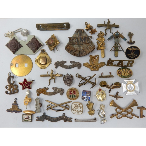 A Collection of Various Badges & Interesting Items