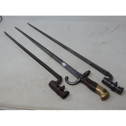 168 - 2 x British Enfield Pattern Bayonets 64cm/53cm together with a French Brass Bayonet 63cm