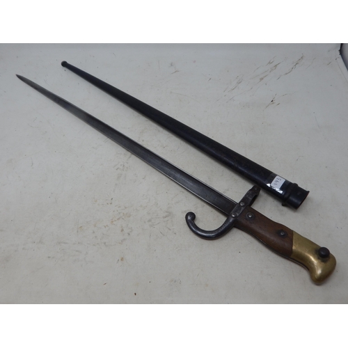 173 - French Haymaker Bayonet with Scabbard. Length 66cm overall