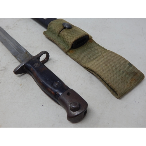 176 - WWI Wilkinson Bayonet with Scabbard. Length 58cm overall