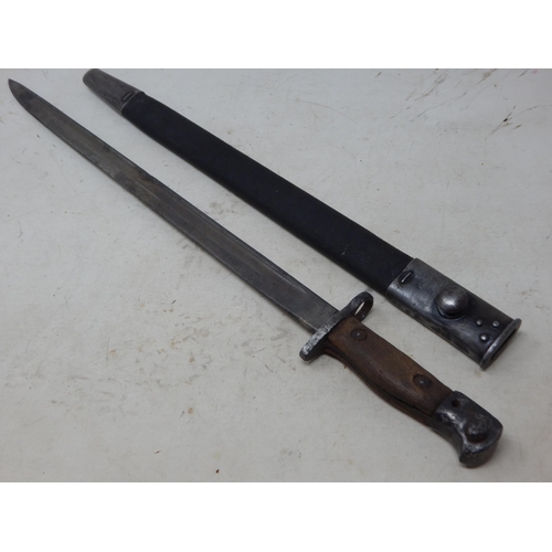 177 - WWI Wilkinson Bayonet with Scabbard. Length 58cm overall