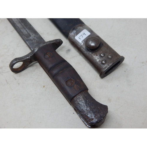 179 - WWI Wilkinson Bayonet with Scabbard. Length 58cm overall