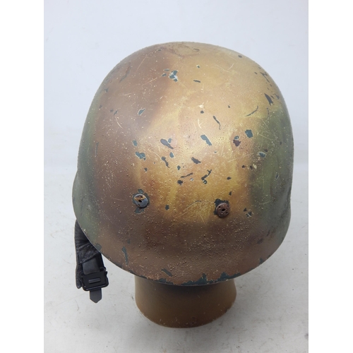 220 - A WWII German Paratroopers Helmet. Note: Customers must satisfy themselves prior to bidding in regar... 